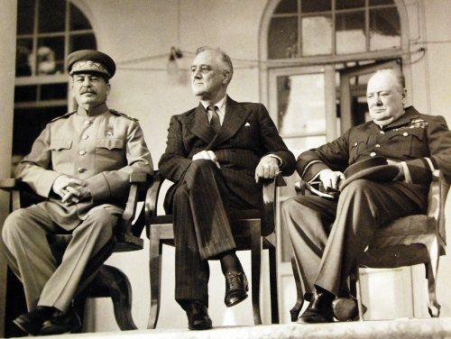 Roosevelt_Churchill_and_Stalin_at_Tehran_Conference_1943_(24108049170).jpg