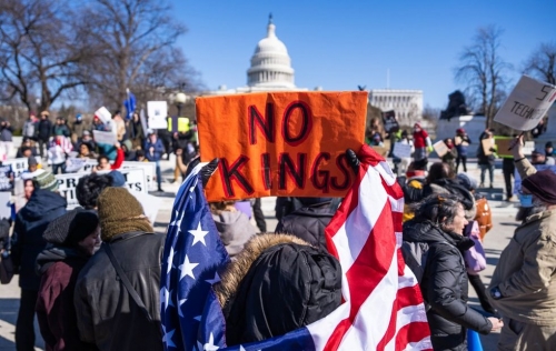 no-kings-in-america-protest-sign-at-the-captiol-building-february-2025-1023097812.jpg