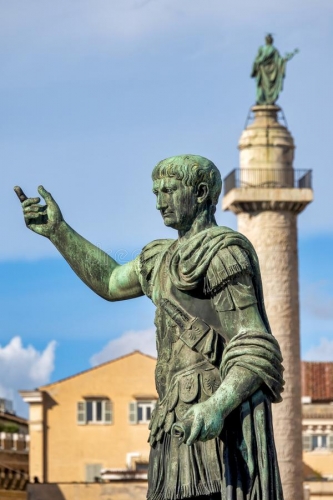 emperor-trajan-statue-column-via-dei-fori-imperiali-rome-italy-165489341.jpg