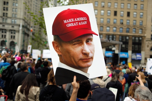 putin-in-maga-hat-longview-2109442088.jpg